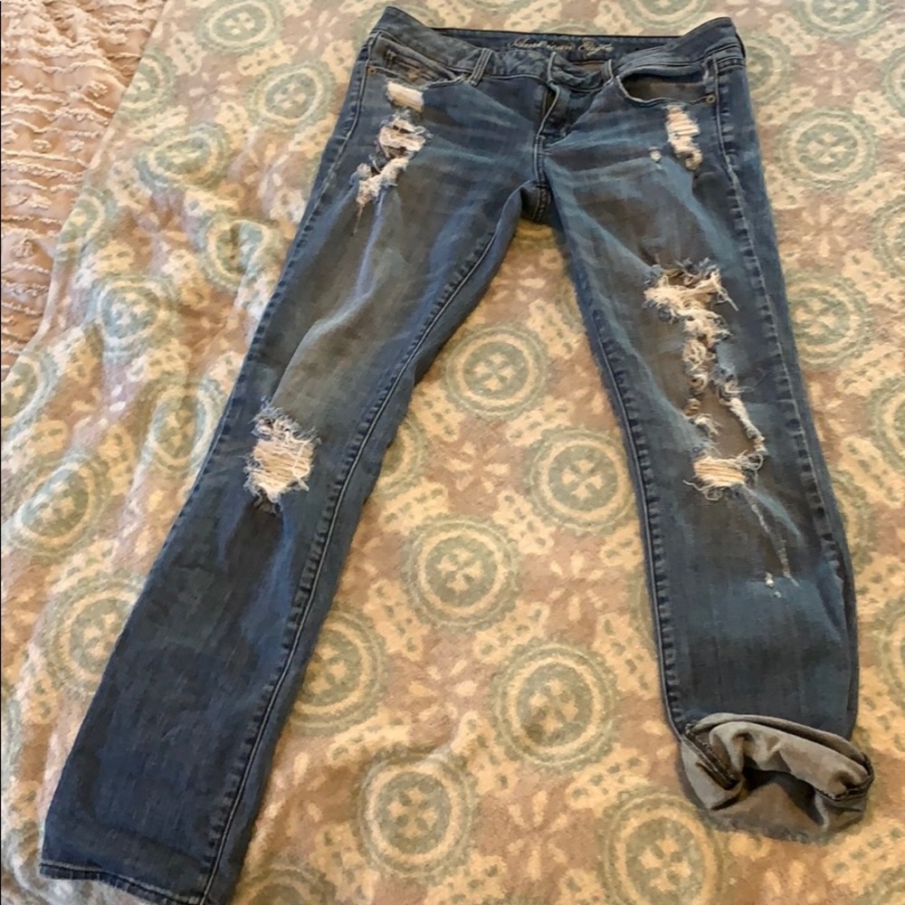 Distressed skinny straight leg jeans